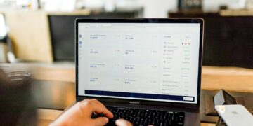 person using MacBook pro