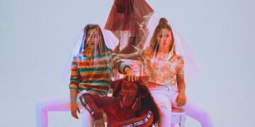 four person sitting on chair with plastic bag covering their heads