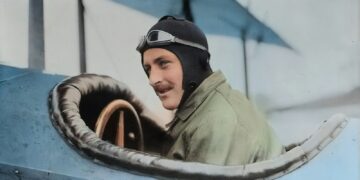 man inside biplane