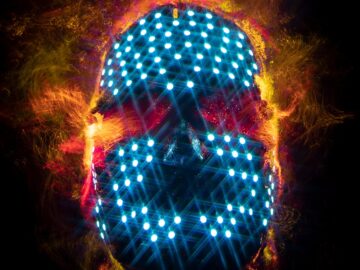 Abstract image of a digital skull with glowing neon lights, representing technology and innovation.