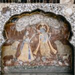 Ancient mural depicting Radha and Krishna in Sheesh Mahal, Lahore, Pakistan.