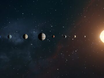 An artistic representation of the solar system showing planets orbiting the sun.