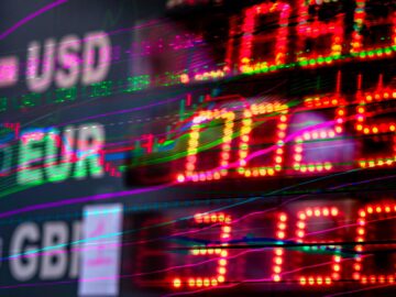 Vibrant stock market display showing exchange rates for USD, EUR, and GBP. Perfect for finance themes.