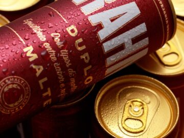 Close-up of Brahma Duplo Malte beer cans with dew, captured in Recife, Brazil.