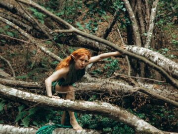A mystical character navigates through an overgrown forest, exuding fantasy vibes.
