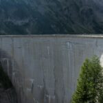View of Grande Dixence Dam in Ayent, Switzerland with alpine backdrop.