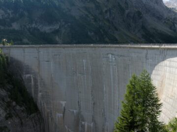 View of Grande Dixence Dam in Ayent, Switzerland with alpine backdrop.