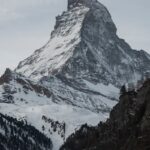 Stunning view of the snowcapped Matterhorn in Zermatt, showcasing its winter beauty and natural grandeur.