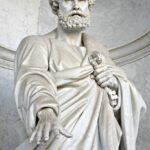 Elegant marble statue depicting a historical figure in Vatican City, Rome, Italy.