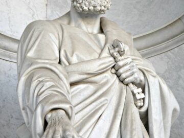 Elegant marble statue depicting a historical figure in Vatican City, Rome, Italy.