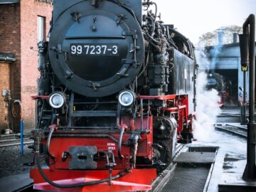 Steam locomotive 99 7237-3 at Wernigerode Railway Station, exuding vintage charm.
