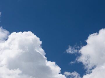 Beautiful clouds with a deep blue sky create an uplifting and natural scene.