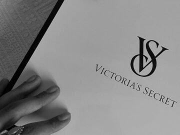 Monochrome image of a Victoria's Secret gift box with ribbon detail.