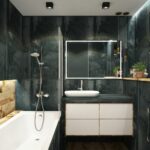 A contemporary bathroom showcasing black marble walls, clean lines, and modern fixtures, exuding luxury and style.