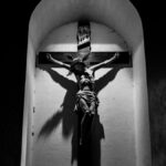 black and white statue of a man