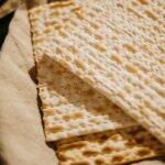 Close-up of traditional unleavened matzah bread, ideal for Passover celebrations.