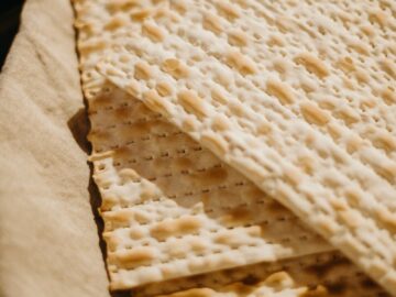 Close-up of traditional unleavened matzah bread, ideal for Passover celebrations.