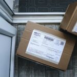 Close-up of a package delivery box on a doorstep, highlighting logistics concepts.