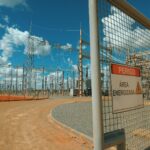 High voltage electrical substation with warning sign in São Gonçalo do Gurguéia, PI, Brazil.