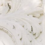 Detailed ornamental bas relief capturing Spanish architectural style.