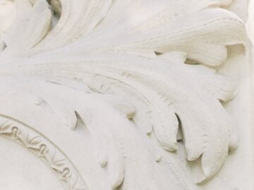 Detailed ornamental bas relief capturing Spanish architectural style.