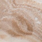 Elegant close-up of granite stone texture, perfect for backgrounds and design projects.