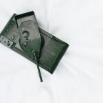 Plastic toy tank with a matte finish on a pristine white backdrop, ideal for military-themed visuals.