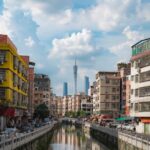 a river with buildings along it