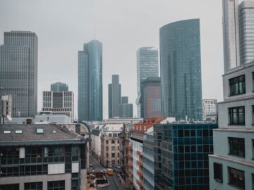 Modern skyscrapers dominate the cityscape, showcasing urban living and architecture.