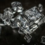 Macro shot of clear crystal cubes showcasing intricate details and textures.