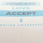 Inspirational poster advocating autism awareness with key messages.