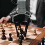 Futuristic AI robot arm making chess move during a game with a human player.