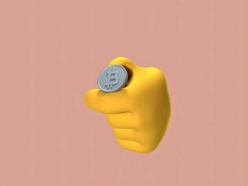 A conceptual image of a yellow hand holding a Bitcoin coin against a pink background, ideal for finance themes.
