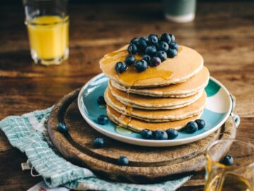 blue and white ceramic plate with pancakes