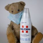 white and blue labeled bottle