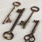 four brass skeleton keys
