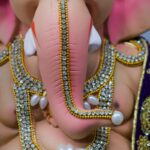 gold and silver beaded necklace