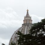 a tall building with a dome on top of it