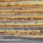 a close up of a wooden wall made of logs