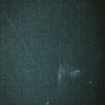 a black and white photo of a blackboard