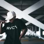 man holding her back