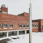 brown and white concrete building during daytime