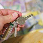 A person holding a bunch of keys in their hand