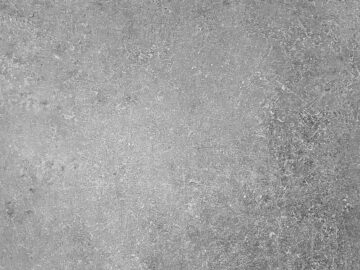 a black and white photo of a concrete wall