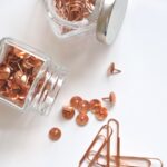 brass thumbtacks and paper clips