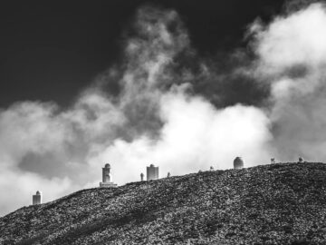 Black and white view of Teide Observatory on a cloudy day in Tenerife, Canary Islands.