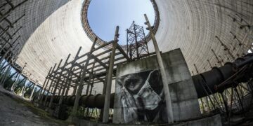 Fisheye lens captures graffiti inside an abandoned Chernobyl reactor.