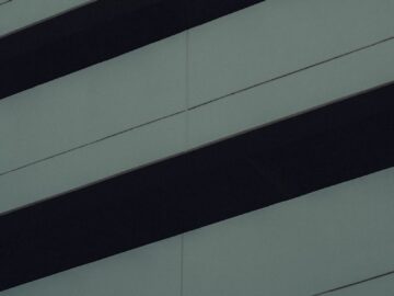 Minimalist architectural detail with dark and light contrasts, showcasing modern urban design.