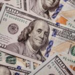 High-resolution image displaying a variety of US dollar banknotes in focus, symbolizing finance.