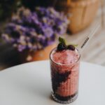 Delicious blackberry mint frozen drink with berry garnish, perfect for summer refreshment.